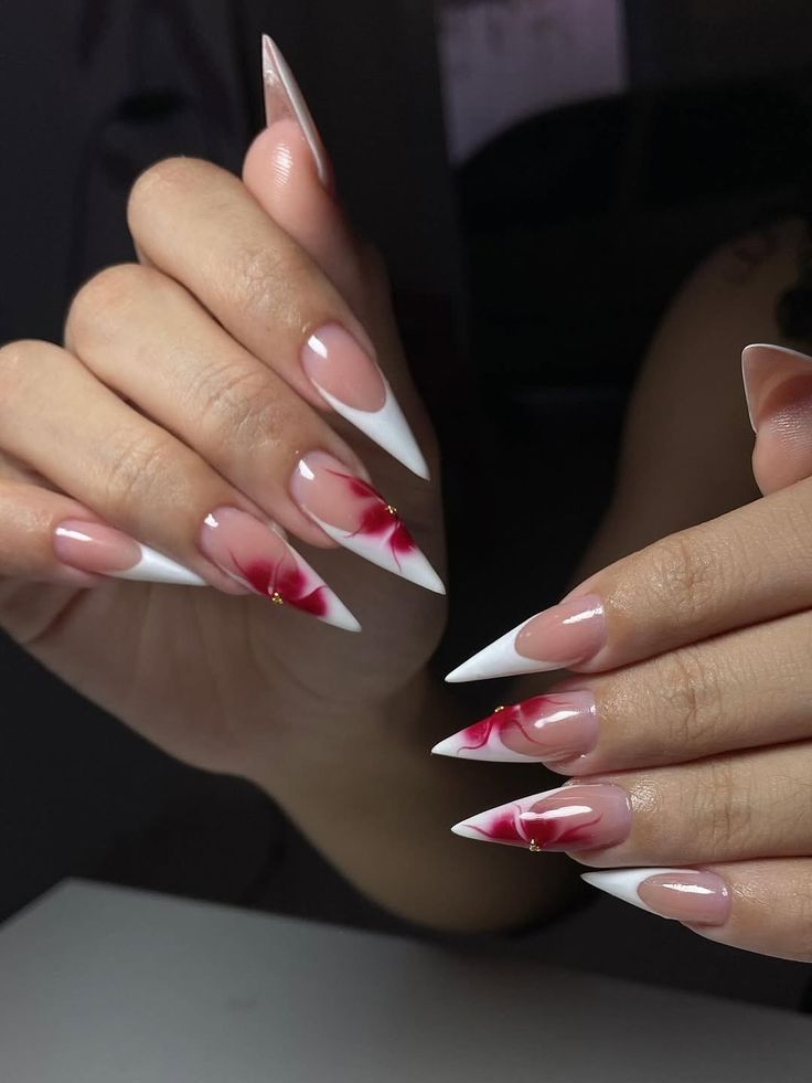 Stiletto French tips with red floral art